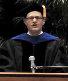 Picture of Seligsohn delivering commencement address