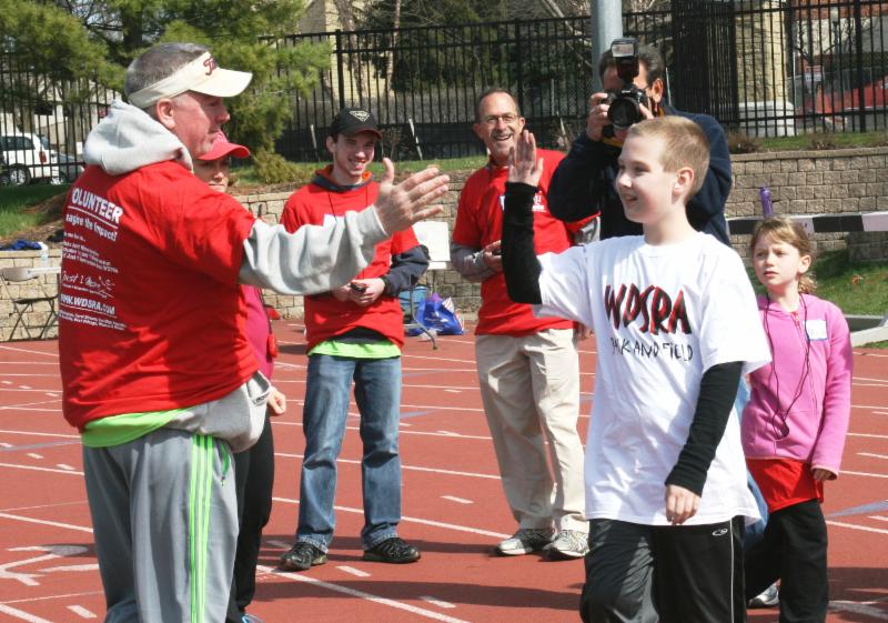 photo of volunteer at the track meet