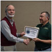 Phil Hesser receives certificate