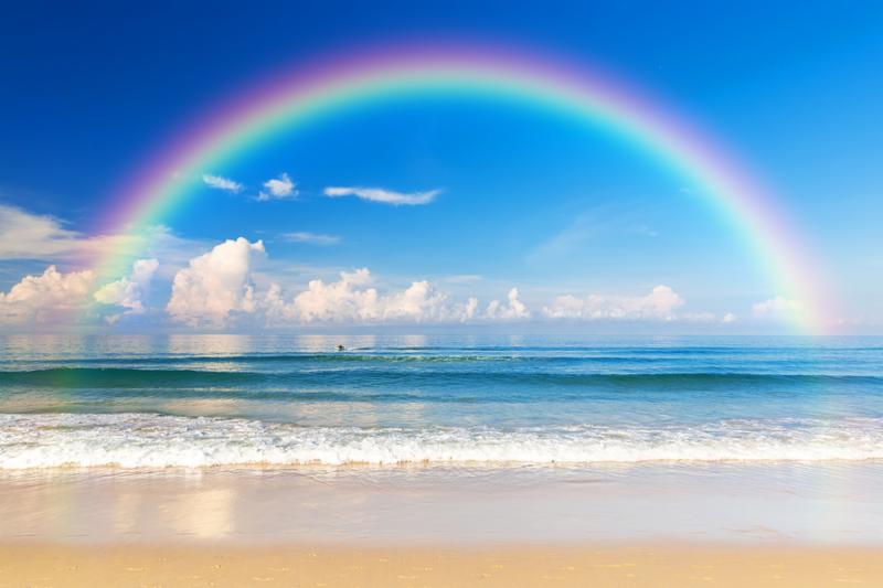 Beautiful sea with a rainbow in the sky. Karon beach Phuket Thailand, Asia