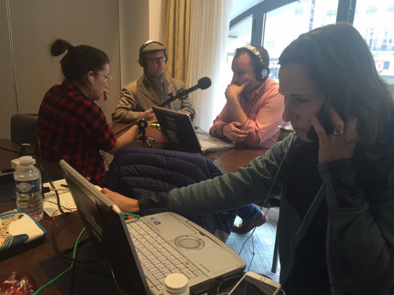 NPR staffers with laptop computers