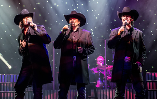 three tenors in cowboy hats