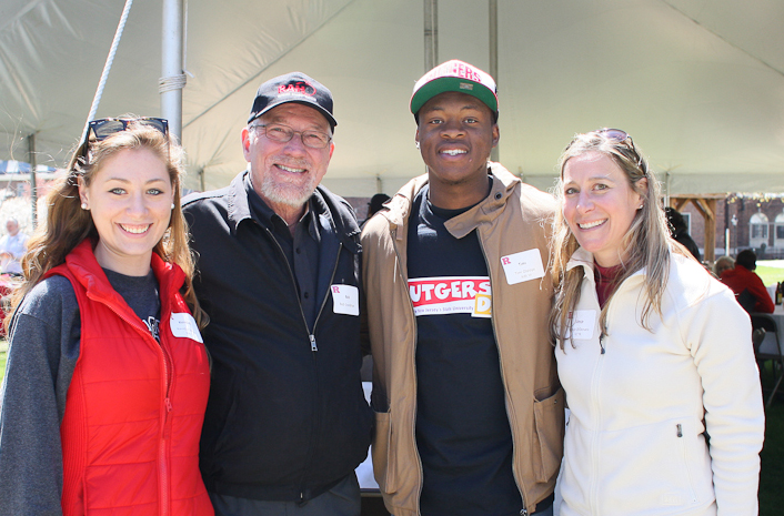 Dean with students and alum