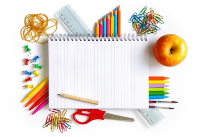 photo of school spiral notebook and school supplies