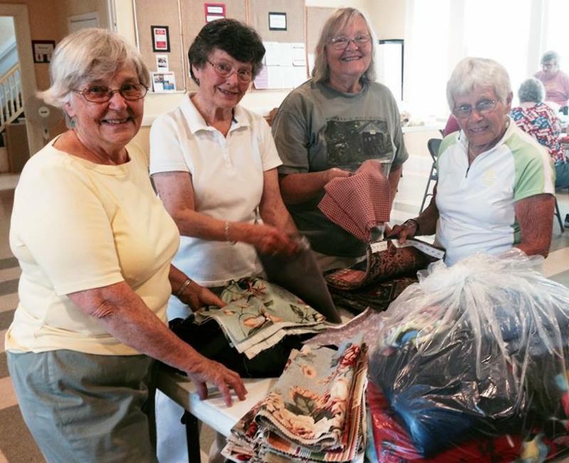 Gwen, Jane, Carole and Janie working on Fair Prep