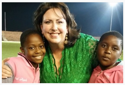 Amy Stockwell with young African girls
