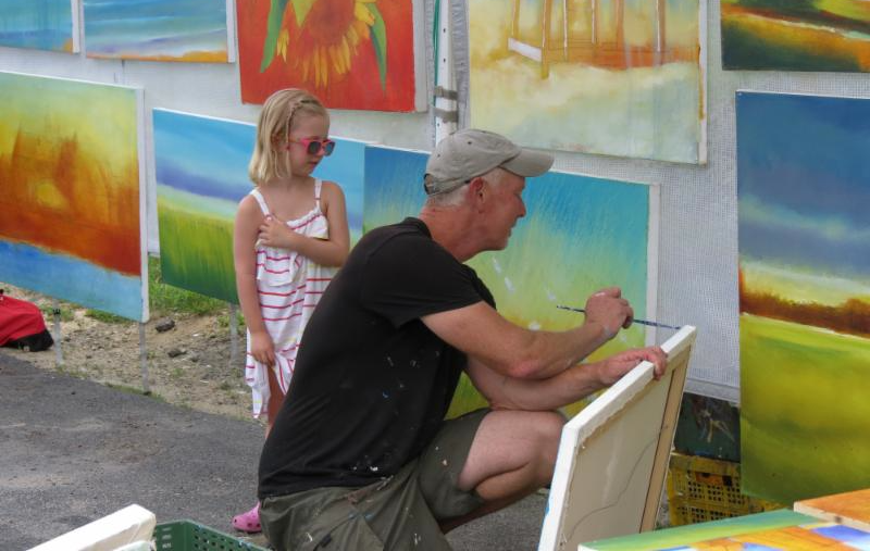 Young girl buying her first piece of art (c) Gerry Grabowski 2014
