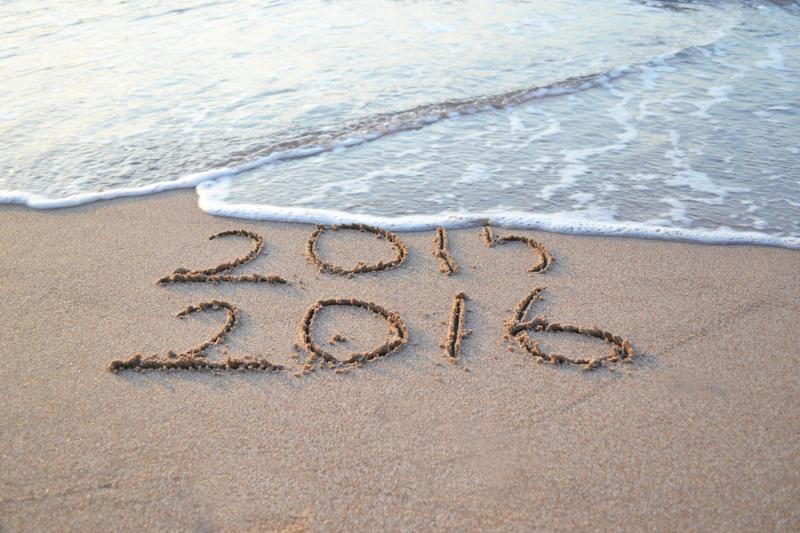 Happy New Year 2016 replace 2015 concept on the sea beach