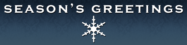 seasons greetings - white letters with a snow flake over a blue background