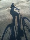 shadow beach biker