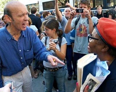 Angry man shouting at a woman peacefully listening