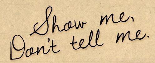 Written words _Show me_ Don_t tell me._