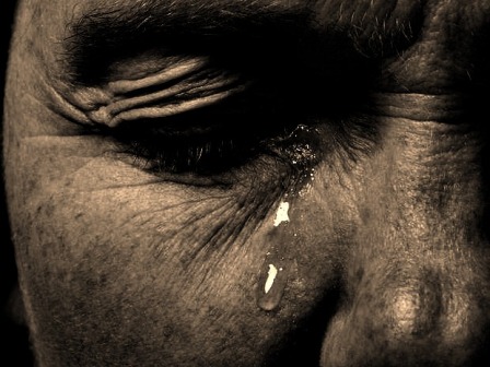 A single tear from a weeping eye