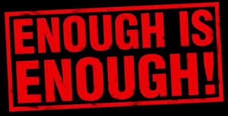 A sign with the words Enough is Enough!