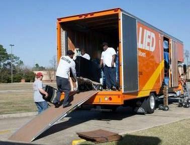 Men packing an Allied moving van