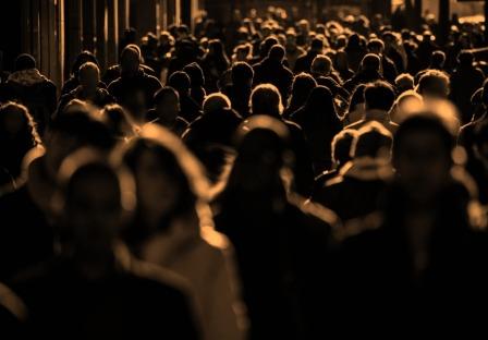 Mindless crowd walking about at night