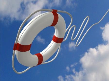 A life preserver tossed against a bright blue sky