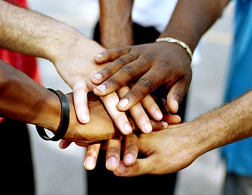 Hands of different colors united