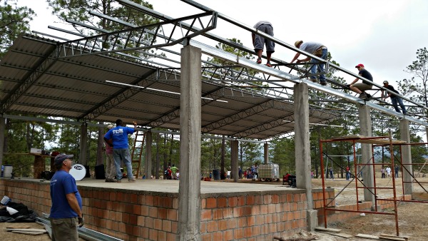 Volunteers work on the church camp in Honduras for Honoring the Thy Father Mission 