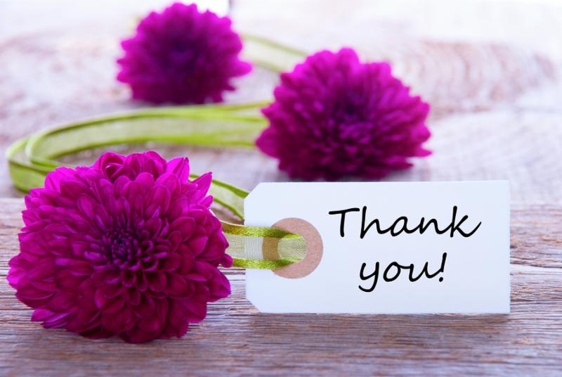Label with Thank You and Purple Flowers and Green Ribbon     Note  Shallow depth of field