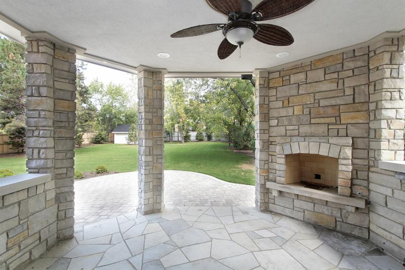 Stone covered patio in new construction home