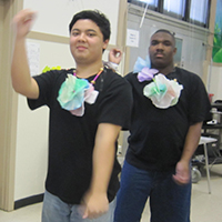 Nico and Trevon dance to Beach Blanket Bingo.