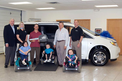 The Davert family and their new vehicle