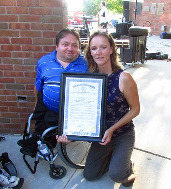 Tom Provoast and Terri Robbins with Governor's proclamation