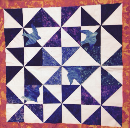 Quilt with turtle doves flying