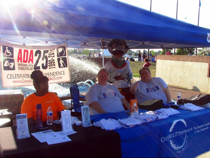 Lou E. Loon at the SVRC / Disability Network welcome tent