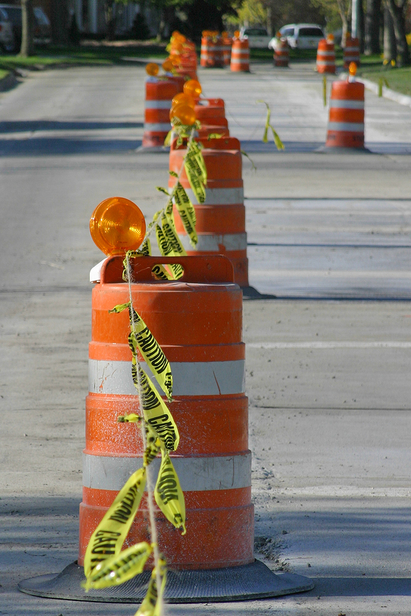 line of road construction barrels