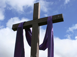 Cross draped with purple cloth