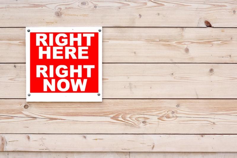 RIGHT HERE RIGHT NOW Red White Sign on Timber Wall Background