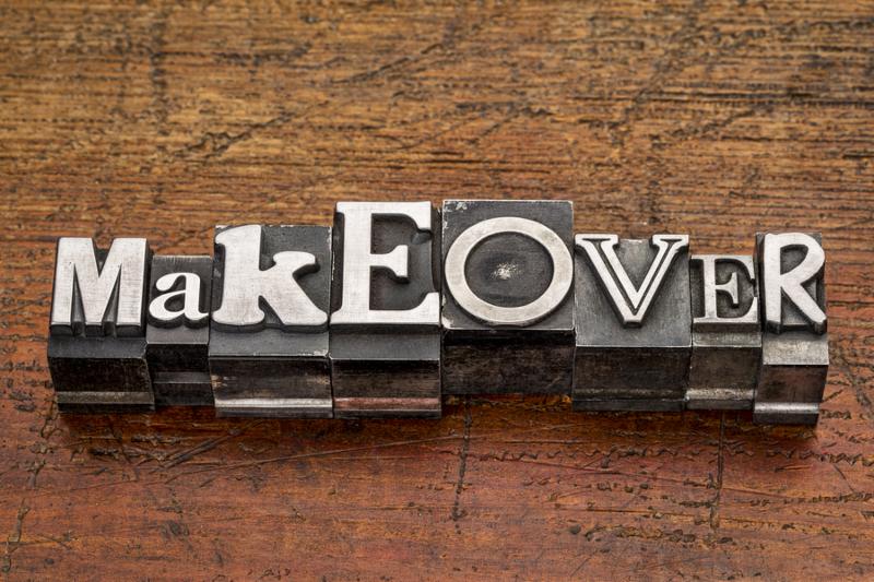 makeover word in mixed vintage metal type printing blocks over grunge wood