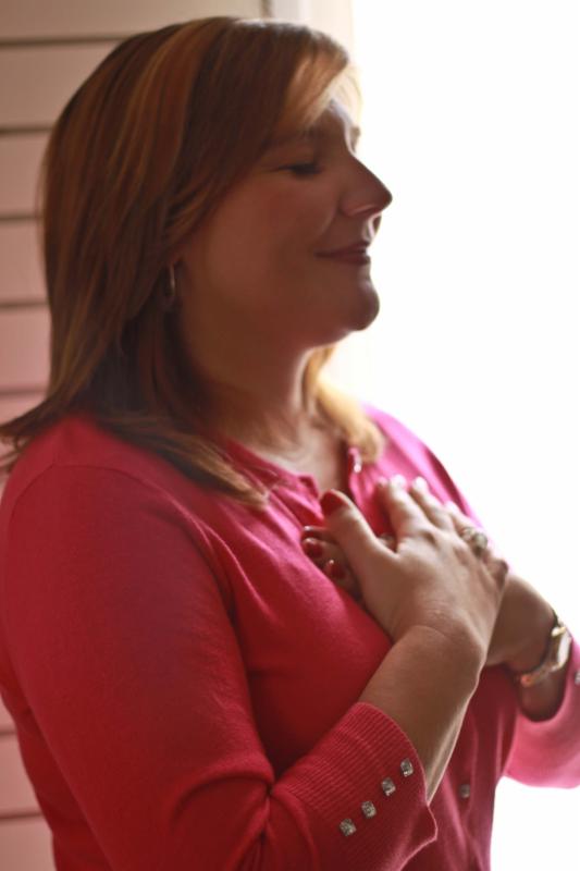 Reiki hands on heart Trine