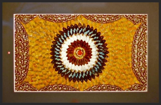 Made in Africa by women whose men gathers the wings from butterflies who have gathered and finished their life cycle.