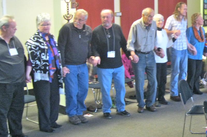 Community members hldinghnds