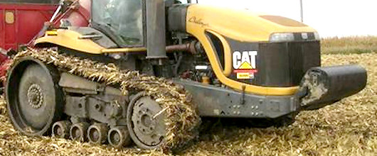 CAT fitted with CAMSO 25in Tracks