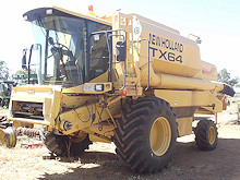 RECEIVED FOR WRECKING (DUBBO)! New Holland TX64 Header