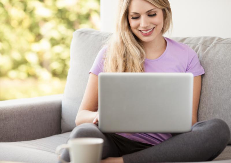 woman_smiling_laptop.jpg