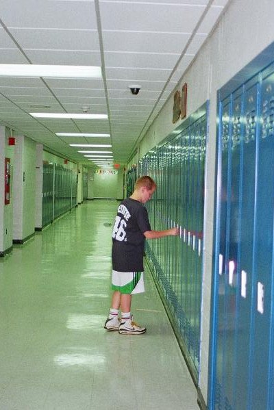 TEMS hall w kid at locker