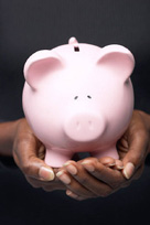 Woman Holding Piggy Bank
