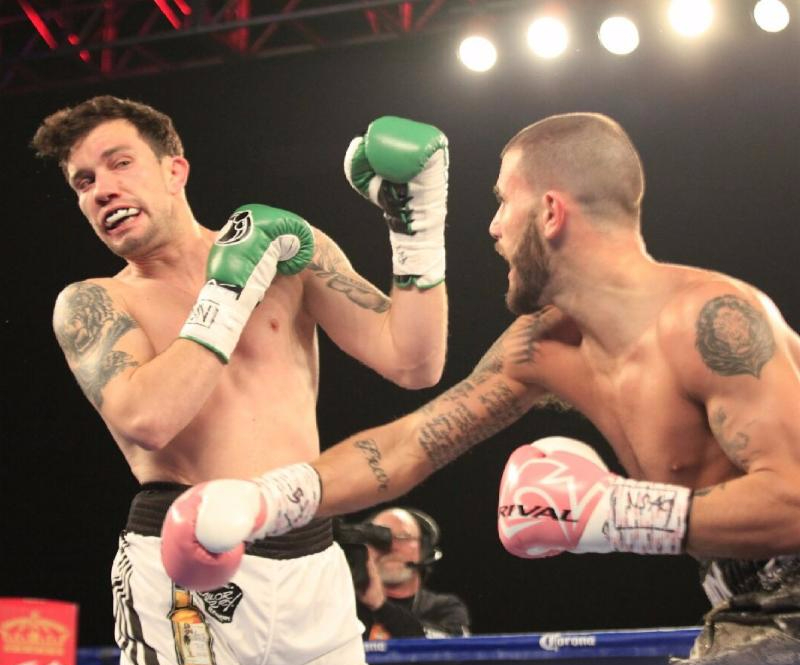 Caleb Plant (Right) lands an overhand right to the face of his opponent.