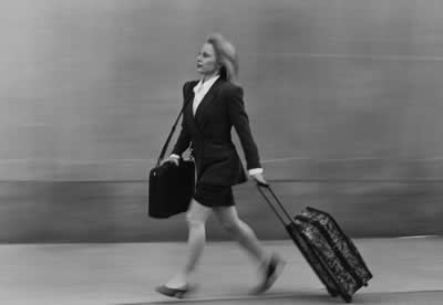 woman-walking-luggage.jpg