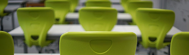 rows of empty chairs in classroom