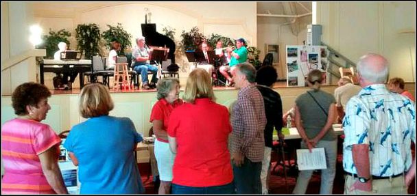 People listing to the Rockers band