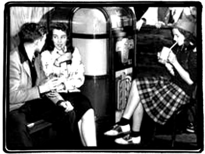 Young people around a jukebox