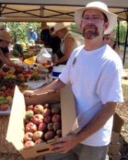Brad Holding Tomato Box