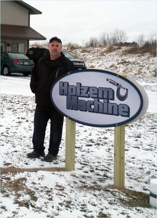 Holzem Machine store sign