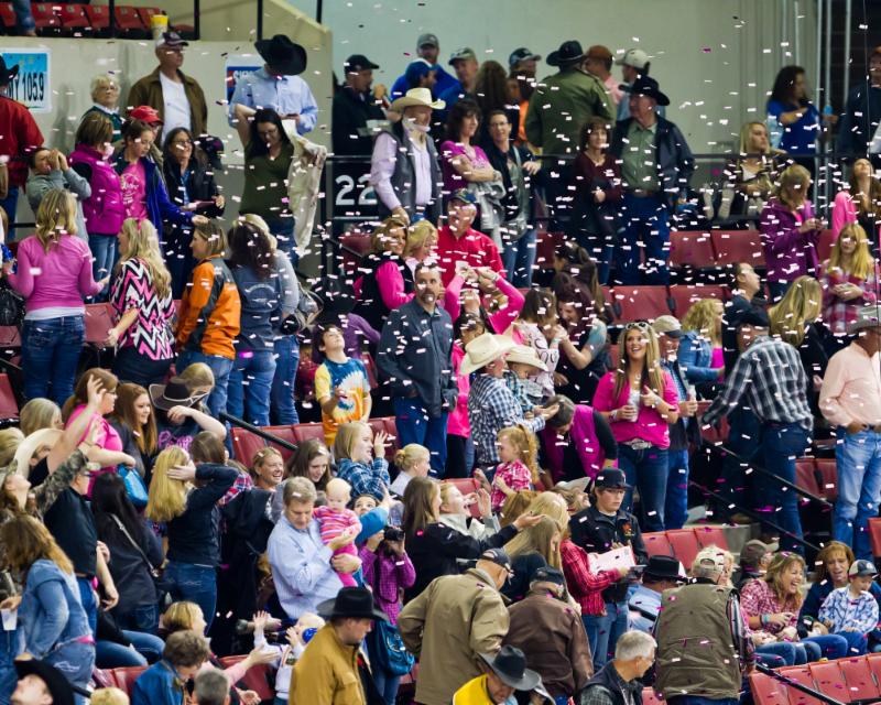 Pin confetti rains down on the crowd.